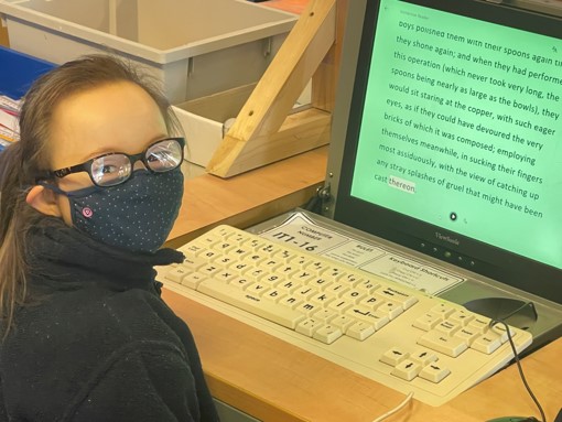 A girl wearing a mask and glasses